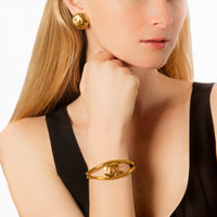 Antique & Vintage Jewelry Chanel Wide Logo Cuff - Bracelets - Broken  English Jewelry – Broken English Jewelry